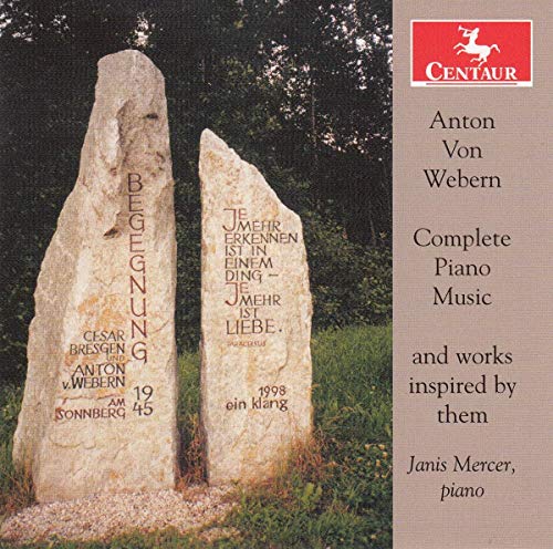 CD cover with two stone monuments and text on a beige background.