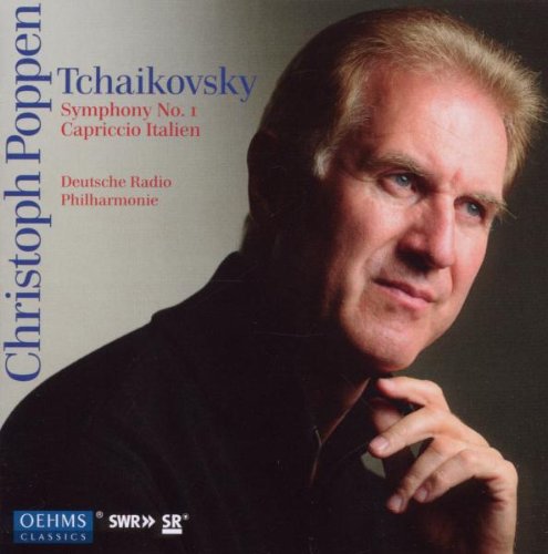 "CD cover featuring a man with blond hair, wearing a black shirt."