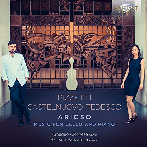 CD cover featuring a man and woman standing beside an ornate metal gate.