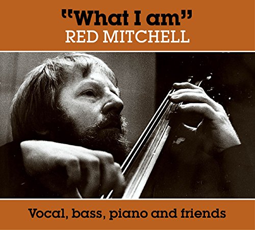 Album cover with black and white photo of man playing double bass, orange borders.