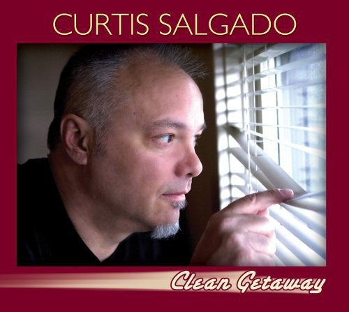 Album cover: man with grey hair and goatee looking out a window with red border.