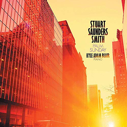 Album cover featuring a cityscape with tall buildings and a bright orange sky.