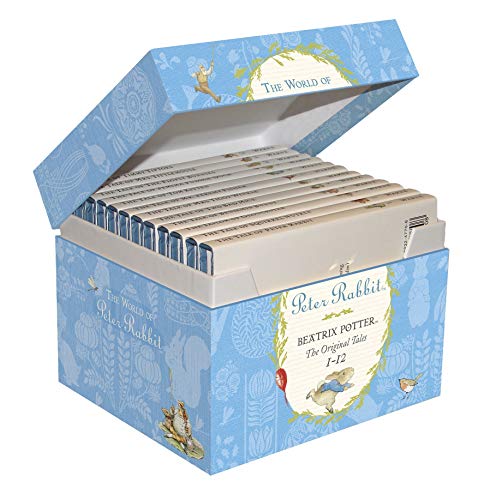 "Blue box set containing 12 small books, titled 'The World of Peter Rabbit'."
