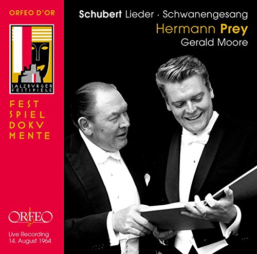 CD cover with two men in tuxedos, one holding sheet music, against a black background.