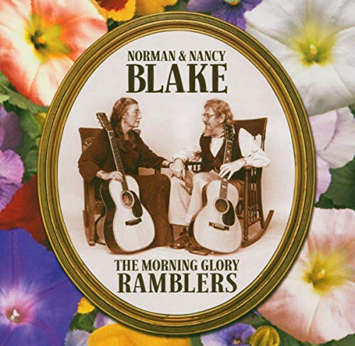 "CD cover featuring Norman and Nancy Blake holding guitars, surrounded by flowers."