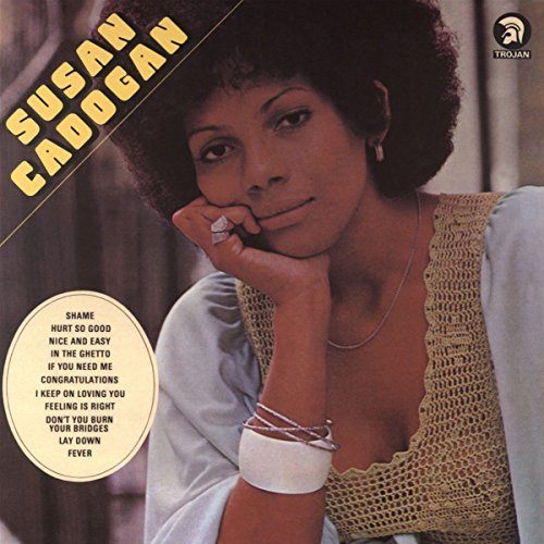 Vinyl record cover featuring a woman with an afro, wearing a white and beige top.