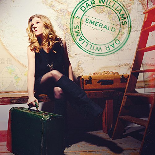 "Album cover featuring a blonde woman sitting on a trunk with a suitcase."