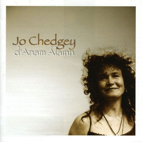 "CD cover with a smiling woman and artist's name, Jo Chedgey."