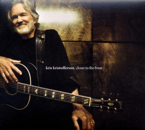 "Kris Kristofferson holding a guitar, album cover with title "Closer to the Bone"."