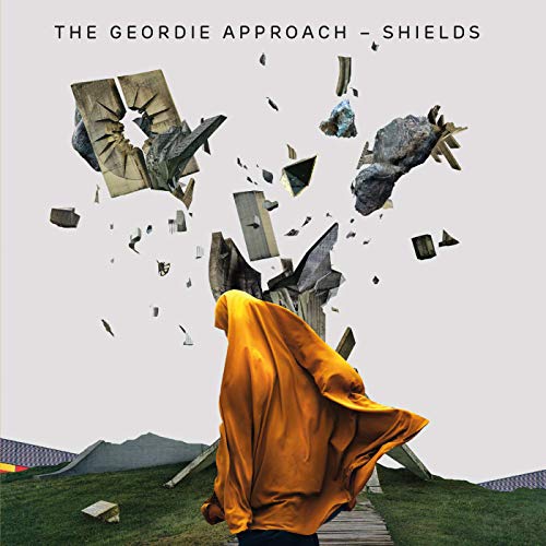 "Album cover with person in orange robe walking towards exploding concrete structure."