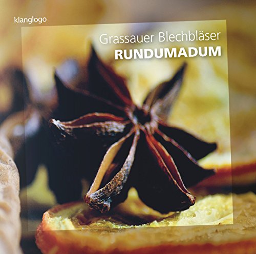 CD cover with a star anise on an orange slice, text overlay.