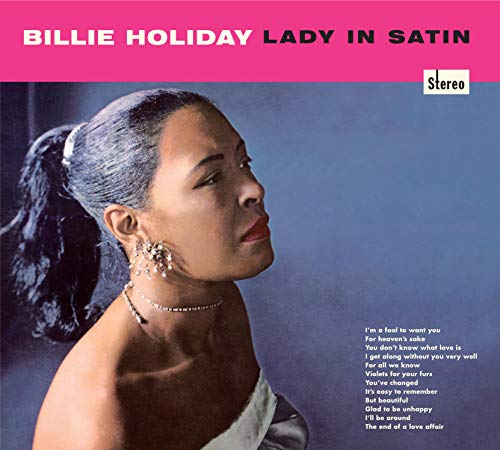 "Album cover featuring Billie Holiday in a white dress, with tracklist and title."
