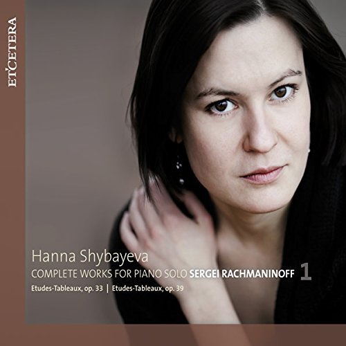 CD cover featuring a woman with dark hair and a brown border.
