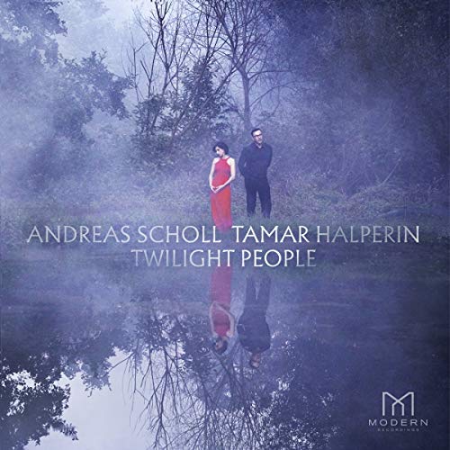 CD album cover with a misty forest scene and two people standing by water.