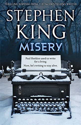 The alt text for the image is: "Book cover of 'Misery' by Stephen King featuring a snow-covered typewriter."