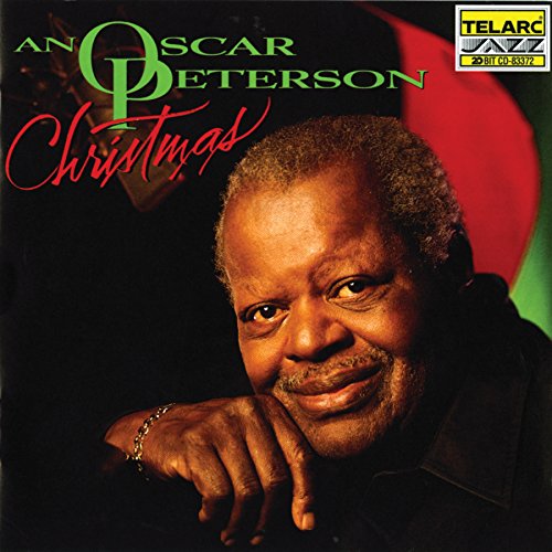 "Oscar Peterson's album cover with a portrait of him against a red and green background."