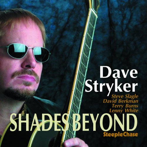 "Album cover with a man holding a guitar and sunglasses."