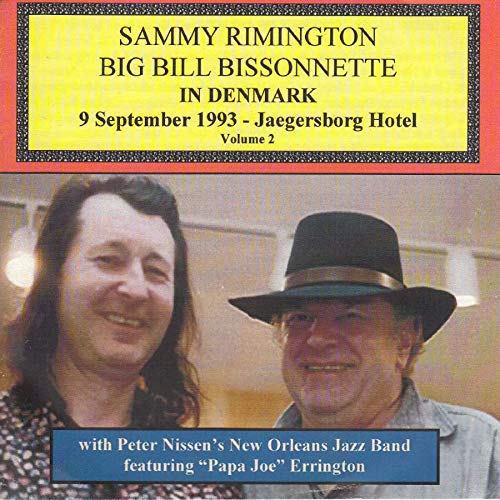 CD cover with two musicians and yellow and blue text boxes.