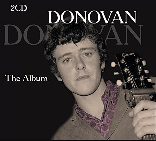 "CD album cover featuring a black-and-white photo of Donovan holding a guitar."