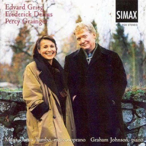"CD cover featuring a man and woman standing together outdoors."