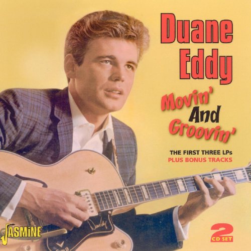 Duane Eddy album cover featuring a man playing guitar against a yellow background.