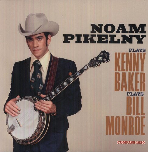 Man in a suit and cowboy hat holding a banjo on a vinyl album cover.