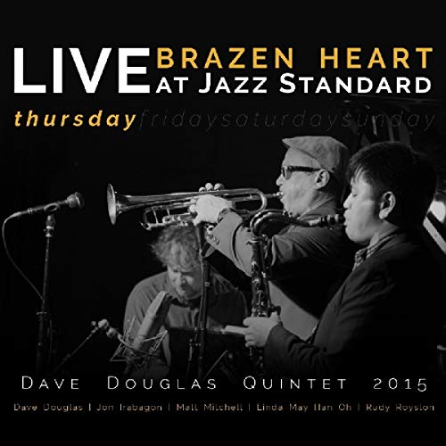 "Album cover with black background, musicians, and 'LIVE BRAZEN HEART' text in white and yellow."