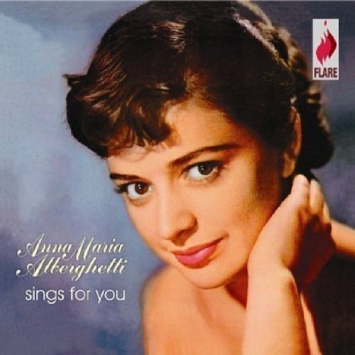 Album cover featuring a woman with dark hair and a blue background.