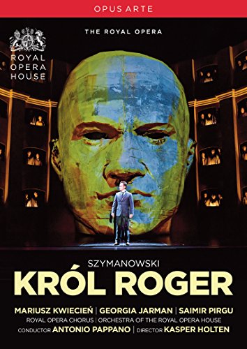 DVD cover featuring a man standing before a large, abstract face, opera house background.