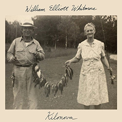 A sepia-toned album cover featuring an elderly couple holding fishing rods and caught fish.