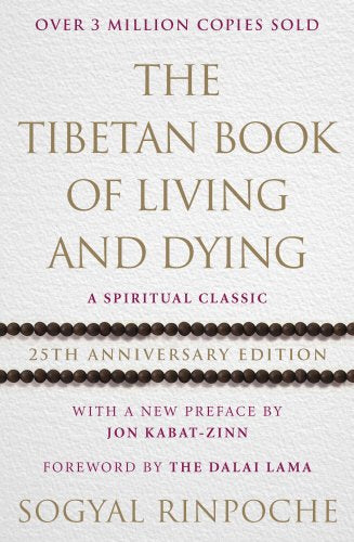 The image shows a book cover with a beige background and gold and red text. Alt text: Beige book cover with gold and red text, featuring "The Tibetan Book of Living and Dying".