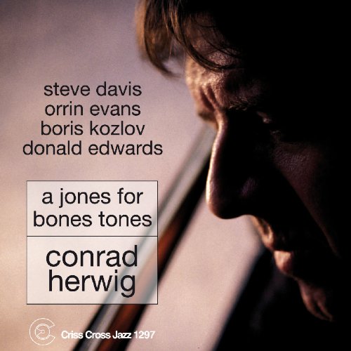 "Jazz album cover with a man's face and musician names in black text."