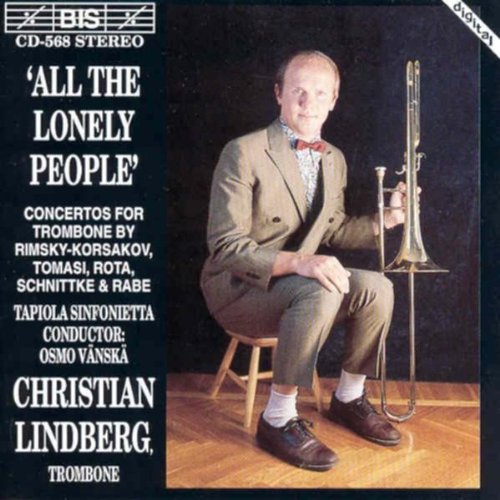 CD cover with a man holding a trombone, wearing a brown suit.