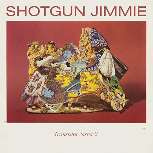 Album cover with colorful, patterned fabrics piled on red background, titled "Shotgun Jimmie - Transistor Sister 2".
