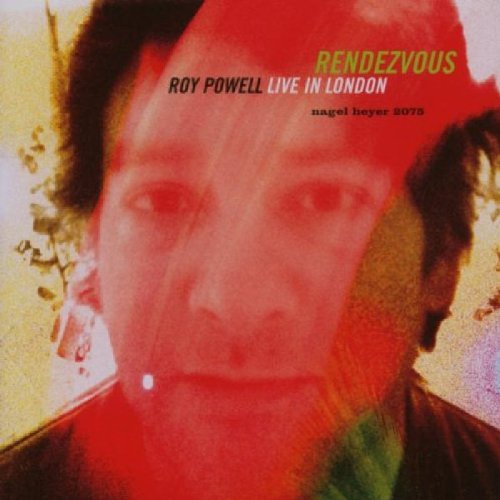 "Album cover with a man's face, red-toned and abstract, with text overlay."