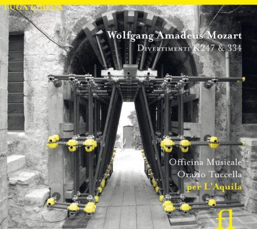 A CD cover featuring a black and white photo of an arched stone passageway.