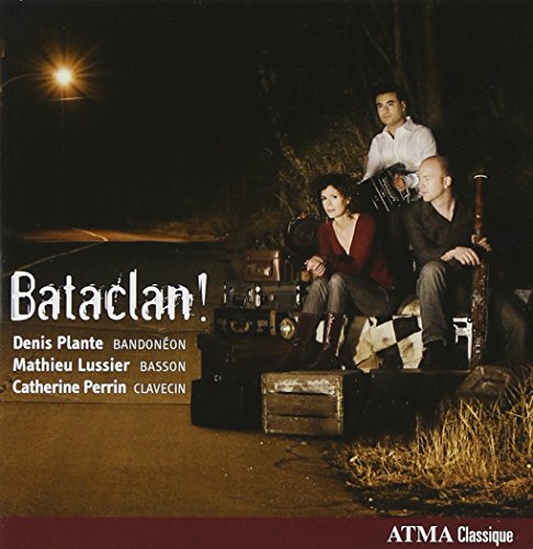 CD cover featuring three musicians sitting on a trunk at night.