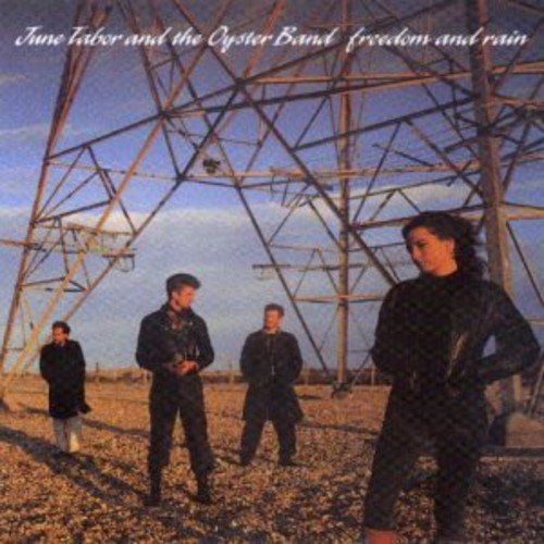 "Album cover with four men standing in front of a power line structure."