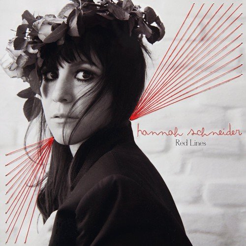 "Album cover featuring a black and white woman's portrait with red lines and text."