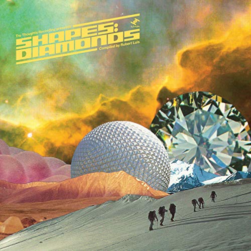 Vinyl album cover with futuristic landscape, large diamonds, and people hiking on a slope.