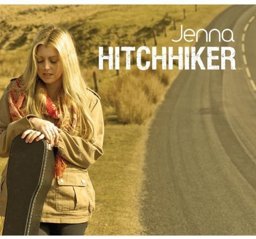 Album cover with blonde woman holding a suitcase on a rural road.
