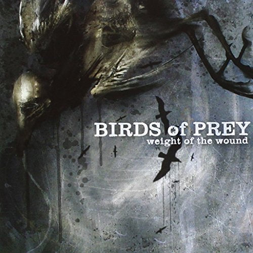 "Album cover art featuring a bird of prey and human skull with text."