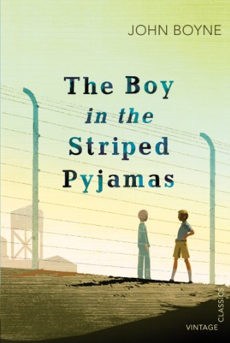 Book cover with two boys standing by a barbed wire fence.