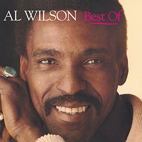 "CD cover with close-up portrait of Al Wilson, smiling, with 'Best Of' text."