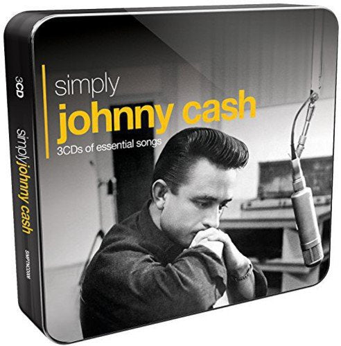 "CD cover featuring black-and-white photo of Johnny Cash in a recording studio."