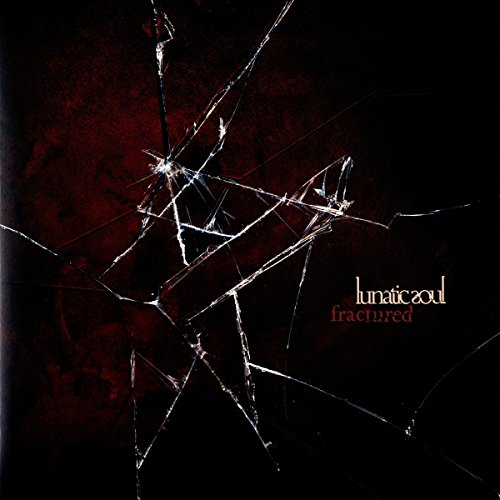 Album cover with shattered glass on a dark red and black background.
