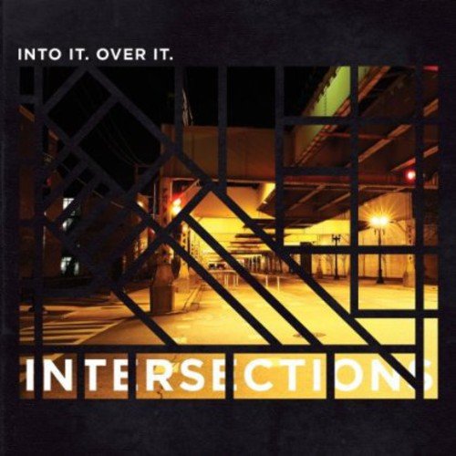 "Album cover with a nighttime city street scene behind a black grid pattern."