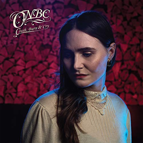 "Album cover featuring a woman with dark hair against a red floral background."