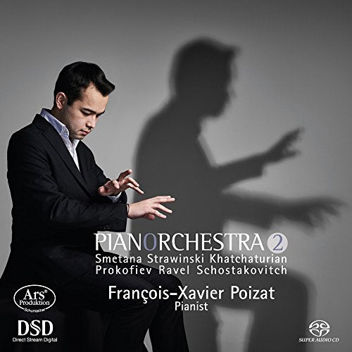 CD cover featuring a man in a black suit against a grey background.