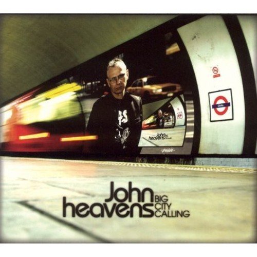 "Album cover with a man standing in a London Underground station."